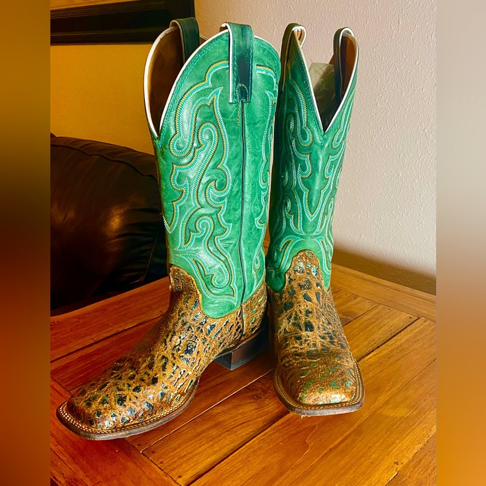 Leopard metallic bullhide cowboy boots. They have turquoise tops